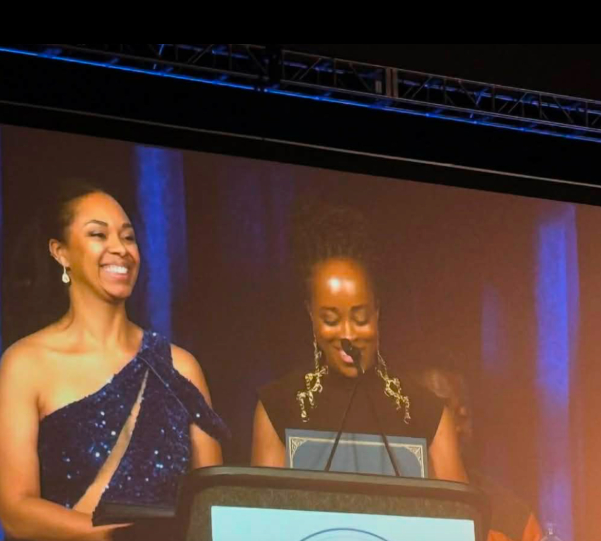 Nina Uzoigwe speaking at a national gala